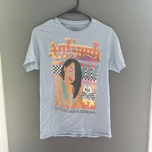 I’m selling a Aaliyah graphic tees that is a baby blue in a size small.
